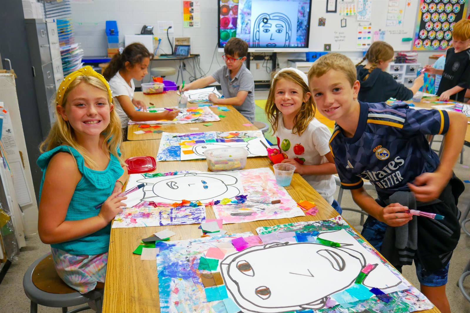 students at an art table
